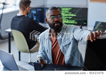 Computer Programmer in IT Company Office Computer Programmer in IT Company Office 95415479