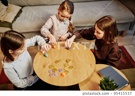 Three Jewish Children Playing Dreidel Three Jewish Children Playing Dreidel 95415537