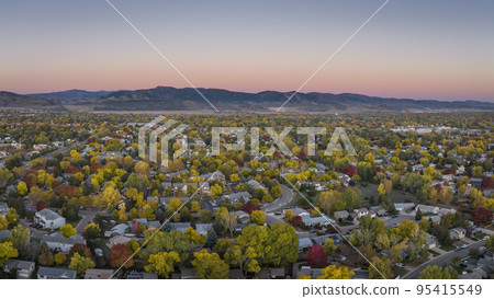 October dawn over city and mountains 95415549