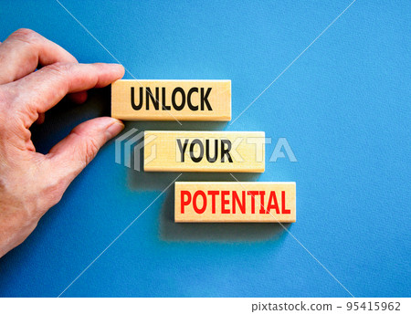 Unlock your potential symbol. Concept words Unlock your potential on wooden blocks. Businessman hand. Beautiful blue background. Business, psychological unlock your potential concept. Copy space. Unlock your potential symbol. Concept words Unlock your potential on wooden blocks. Businessman hand. Beautiful blue background. Business, psychological unlock your potential concept. Copy space. 95415962