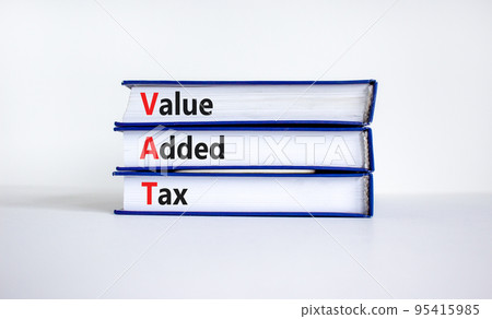 VAT, value added tax symbol. Books with concept words 'VAT, value added tax'. Beautiful white background, copy space. Business and VAT, value added tax concept. VAT, value added tax symbol. Books with concept words 'VAT, value added tax'. Beautiful white background, copy space. Business and VAT, value added tax concept. 95415985