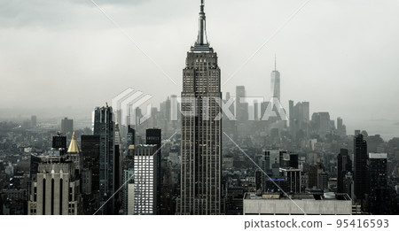 Black and white photograph of the rooftops of downtown New York in classic noir style Black and white photograph of the rooftops of downtown New York in classic noir style 95416593