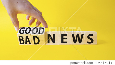 Good news and Bad news symbol. Businessman hand turns wooden cubes and changes words Bad news to Good news. Beautiful yellow background. Business concept. Copy space Good news and Bad news symbol. Businessman hand turns wooden cubes and changes words Bad news to Good news. Beautiful yellow background. Business concept. Copy space 95416914
