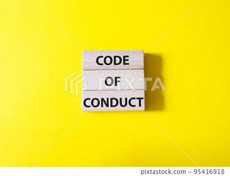 Code of conduct symbol. Wooden blocks with words Code of conduct. Beautiful yellow background. Business and Code of conduct concept. Copy space. 95416918