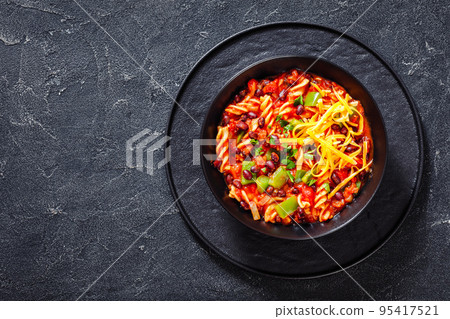 Black Bean Soup with spiral pasta and vegetables 95417521