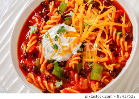 Black Bean Soup with spiral pasta and vegetables 95417522