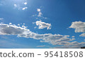 White clouds floating in the blue sky 95418508