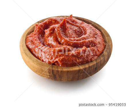 bowl of tomato and red pepper dip bowl of tomato and red pepper dip 95419033