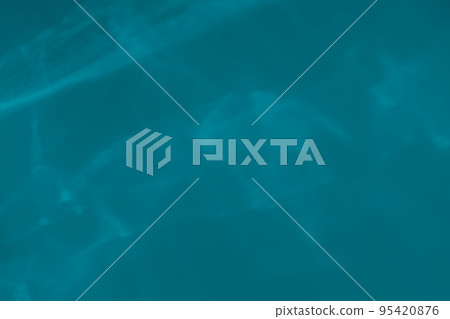Blue colored abstract background with light and shadows caustic effect Blue colored abstract background with light and shadows caustic effect 95420876