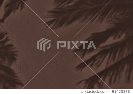 Shadow of leaves on brown concrete wall texture background Shadow of leaves on brown concrete wall texture background 95420878