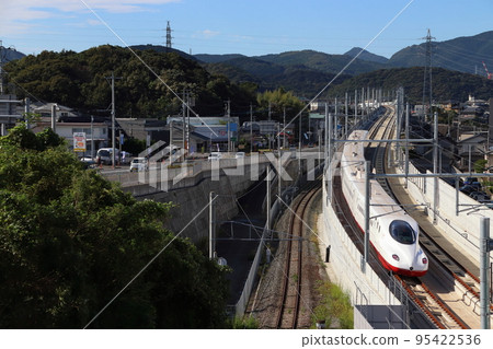 Nishikyushu Shinkansen N700S series going through Isahaya City 95422536
