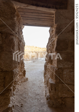 Mount Herodion and the ruins of the fortress of King Herod inside an artificial crater. The Judaean Desert, West Bank. 95424255