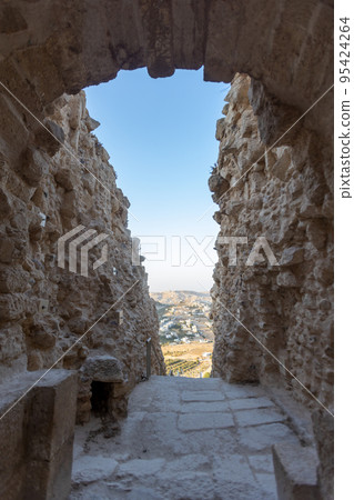 Mount Herodion and the ruins of the fortress of King Herod inside an artificial crater. The Judaean Desert, West Bank. 95424264