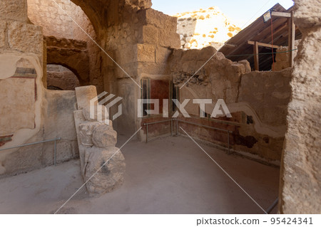 Mount Herodion and the ruins of the fortress of King Herod inside an artificial crater. The Judaean Desert, West Bank. 95424341