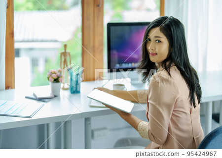data analysis, plan, marketing, accounting, audit, Portrait of asian business woman planning marketing using tablet and computer to present marketing plan project at meeting 95424967