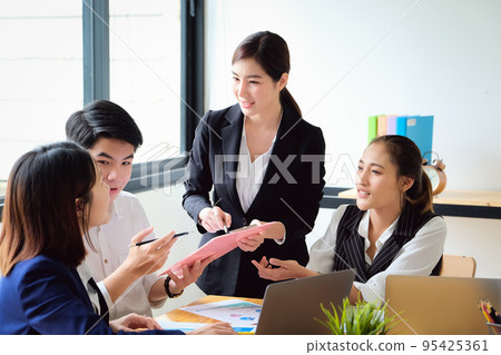 Start-up Business, a team of young entrepreneurs working together to increase profits into the company to increase business potential. 95425361