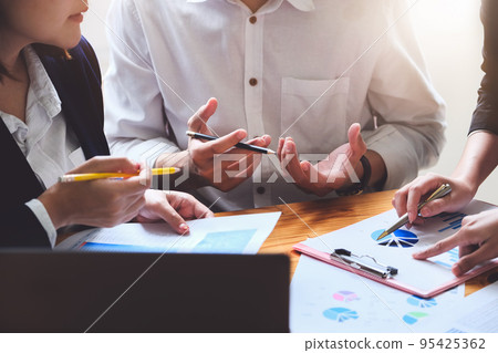 Start-up Business, a team of young entrepreneurs working together to increase profits into the company to increase business potential. 95425362