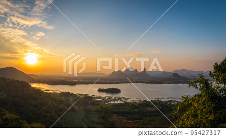 Panorama Landscape of Mountains and lakes in sunset at Phu Sub Lek Reservoir, Lopburi, Thailand. A new attraction that is highly popular. 95427317
