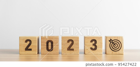 2023 block with dartboard icon. Goal, Target, Resolution, strategy, plan, Action, mission, motivation, and New Year start concepts 95427422