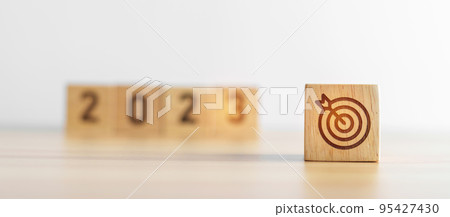 2023 block with dartboard icon. Goal, Target, Resolution, strategy, plan, Action, mission, motivation, and New Year start concepts 95427430