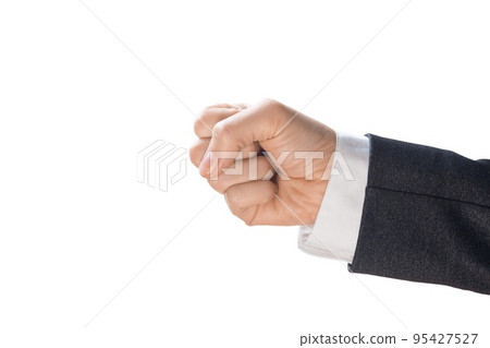 Aggressive gesture. Human hand clenched into a fist in a sleeve of a business suit, close up, isolated on white. Aggressive gesture. Human hand clenched into a fist in a sleeve of a business suit, close up, isolated on white. 95427527