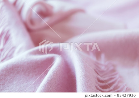 Cashmere texture, natural wool, pink cashmere scarf folded, top view, concept of warmth and winter comfort Cashmere texture, natural wool, pink cashmere scarf folded, top view, concept of warmth and winter comfort 95427930
