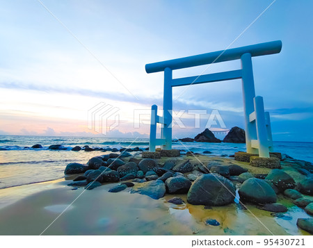 Itoshima Futamigaura Meotoiwa Rocks Sakurai Shrine Before sunset 95430721