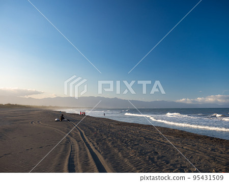 Sand dunes against sunset light on a beach in Yilan,Taiwan. Sand dunes against sunset light on a beach in Yilan,Taiwan. 95431509