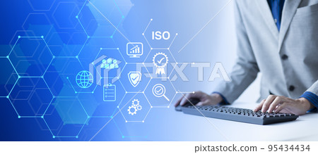 ISO Certification of standards quality control assurance business technology concept. Businessman using virtual screen iso certification icon to guarantee. ISO Certification of standards quality control assurance business technology concept. Businessman using virtual screen iso certification icon to guarantee. 95434434