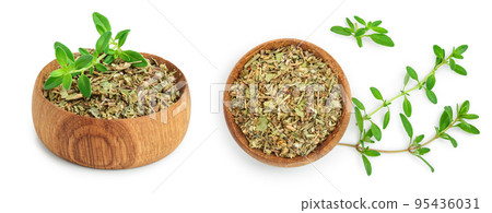 Dried thyme leaves in the wooden bowl, with fresh thyme isolated on white background Dried thyme leaves in the wooden bowl, with fresh thyme isolated on white background 95436031