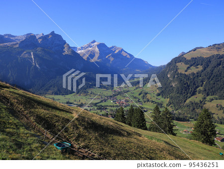 Village Gsteig Bei Gstaad and high mountains. Village Gsteig Bei Gstaad and high mountains. 95436251