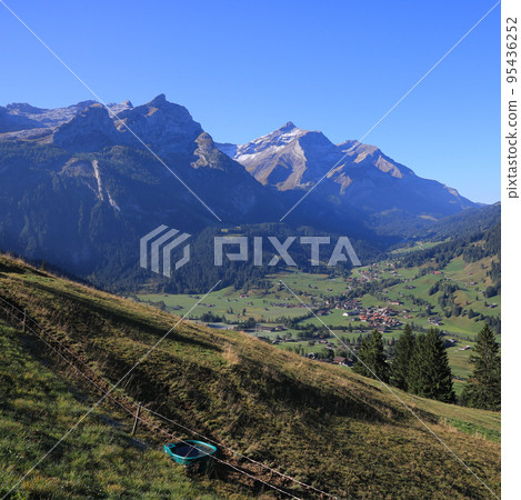 Village Gsteig Bei Gstaad and high mountains. 95436252