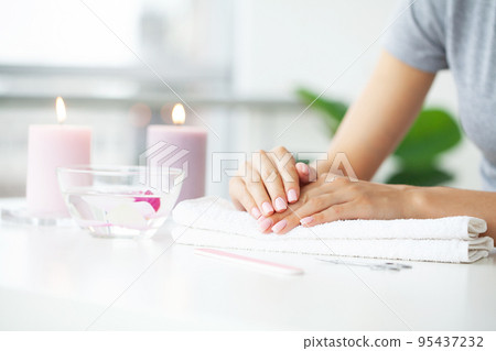 Young woman doing manicure from at home 95437232