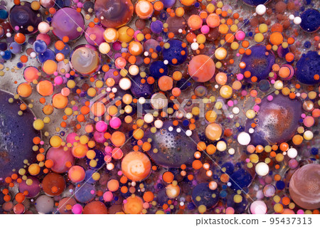 Acrylic paint balls abstract texture. Bright colors fluid, flowing wallpaper design. Purple, blue, pink and yellow liquids mix. 95437313