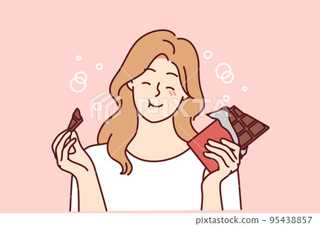 Smiling girl eating chocolate bar Smiling girl eating chocolate bar 95438857
