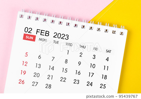 The February 2023 Monthly desk calendar for 2023 year on beautiful background. 95439767