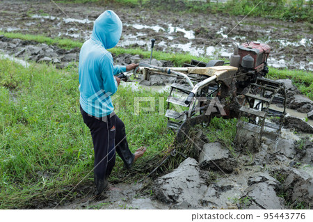 People are plowing fields People are plowing fields 95443776