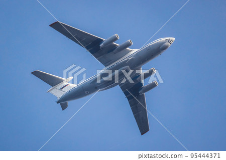 Russian turbofan strategic airlifter is in blue sky 95444371
