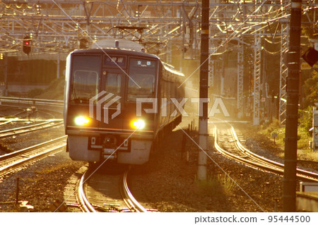 A commuter train entering Yamazaki Station on Stock Photo