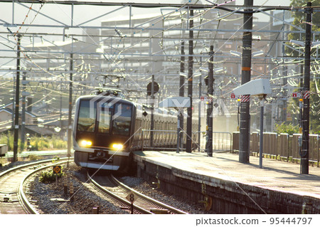 A commuter vehicle entering Yamazaki Station on Stock Photo