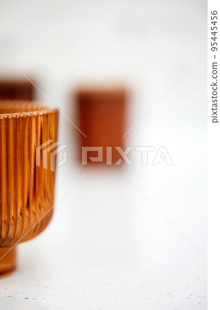 stylish brown faceted glass. the selective focus stylish brown faceted glass. the selective focus 95445456