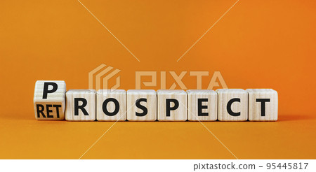 Prospect or retrospect symbol. Turned a cube and changed the word 'retrospect' to 'prospect'. Beautiful orange background. Business and prospect or retrospect concept. Copy space. Prospect or retrospect symbol. Turned a cube and changed the word 'retrospect' to 'prospect'. Beautiful orange background. Business and prospect or retrospect concept. Copy space. 95445817