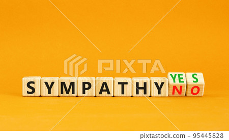 Sympathy yes or no symbol. Concept words Sympathy yes or Sympathy no on wooden cubes. Beautiful orange table orange background. Business sympathy yes or no concept. Copy space. Sympathy yes or no symbol. Concept words Sympathy yes or Sympathy no on wooden cubes. Beautiful orange table orange background. Business sympathy yes or no concept. Copy space. 95445828