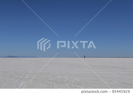 Salt Flats in Utah. Salt Flats Landscape. Blue Sky and Snow-White Salt Soil. Bonneville Salt Flats Salt Flats in Utah. Salt Flats Landscape. Blue Sky and Snow-White Salt Soil. Bonneville Salt Flats 95445929