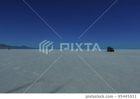 Salt Flats in Utah. Salt Flats Landscape. Blue Sky and Snow-White Salt Soil. Bonneville Salt Flats 95445931