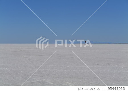 Salt Flats in Utah. Salt Flats Landscape. Blue Sky and Snow-White Salt Soil. Bonneville Salt Flats 95445933