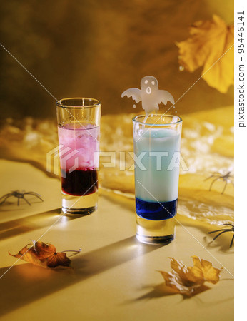 Magic potion in a glass with ghost. Fairy Halloween Cocktail Magic potion in a glass with ghost. Fairy Halloween Cocktail 95446141