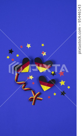German style abstract background, hearts and ribbon in the colors of the German flag German style abstract background, hearts and ribbon in the colors of the German flag 95446143