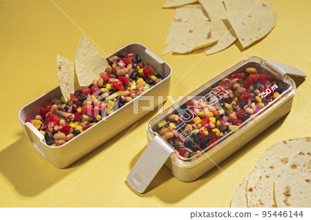 cowboy caviar, texas caviar with black bean, tomatoes, avocado, red bell pepper, corn in lunch box cowboy caviar, texas caviar with black bean, tomatoes, avocado, red bell pepper, corn in lunch box 95446144