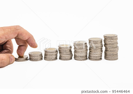 Fingers step on a stack of coins in ascending order. Ffinancial growth and improvement concept Fingers step on a stack of coins in ascending order. Ffinancial growth and improvement concept 95446464